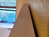 2022-03-21 08.51.55  Top view.  You can see the brad nails holding the Interior Column Sides.  The square-drive screws hold the backing board in place - it is inset into the outer frame such that it is flush with the back of the frame.